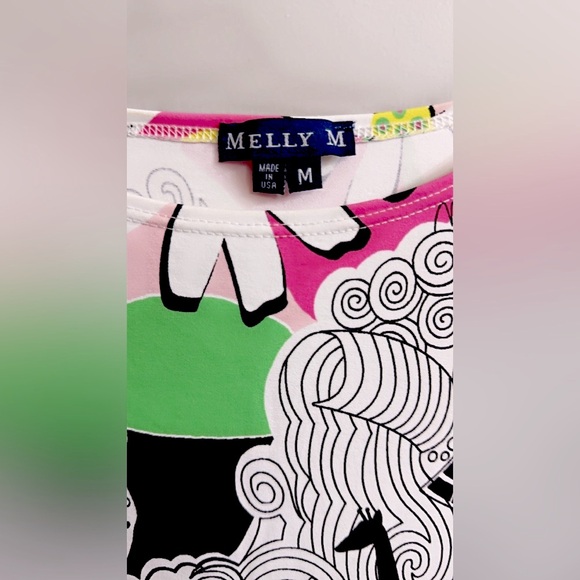 NWOT Melly M Abstract Print Dress Size M Pit to Pit 18”
stretches up to 23” - Picture 5 of 7